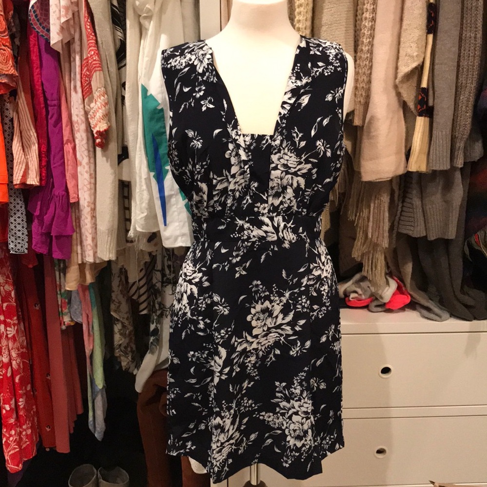 Navy and white floral mini dress with button back